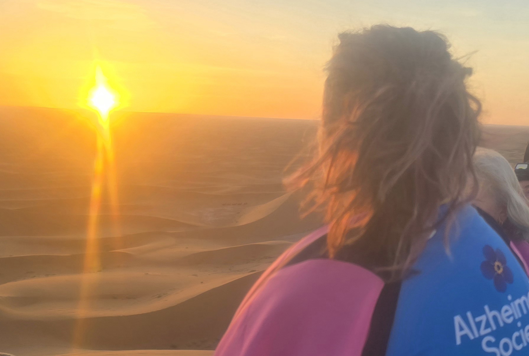 A person looking at Sunrise view
